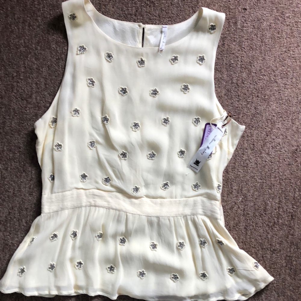Cream Sleeveless Blouse